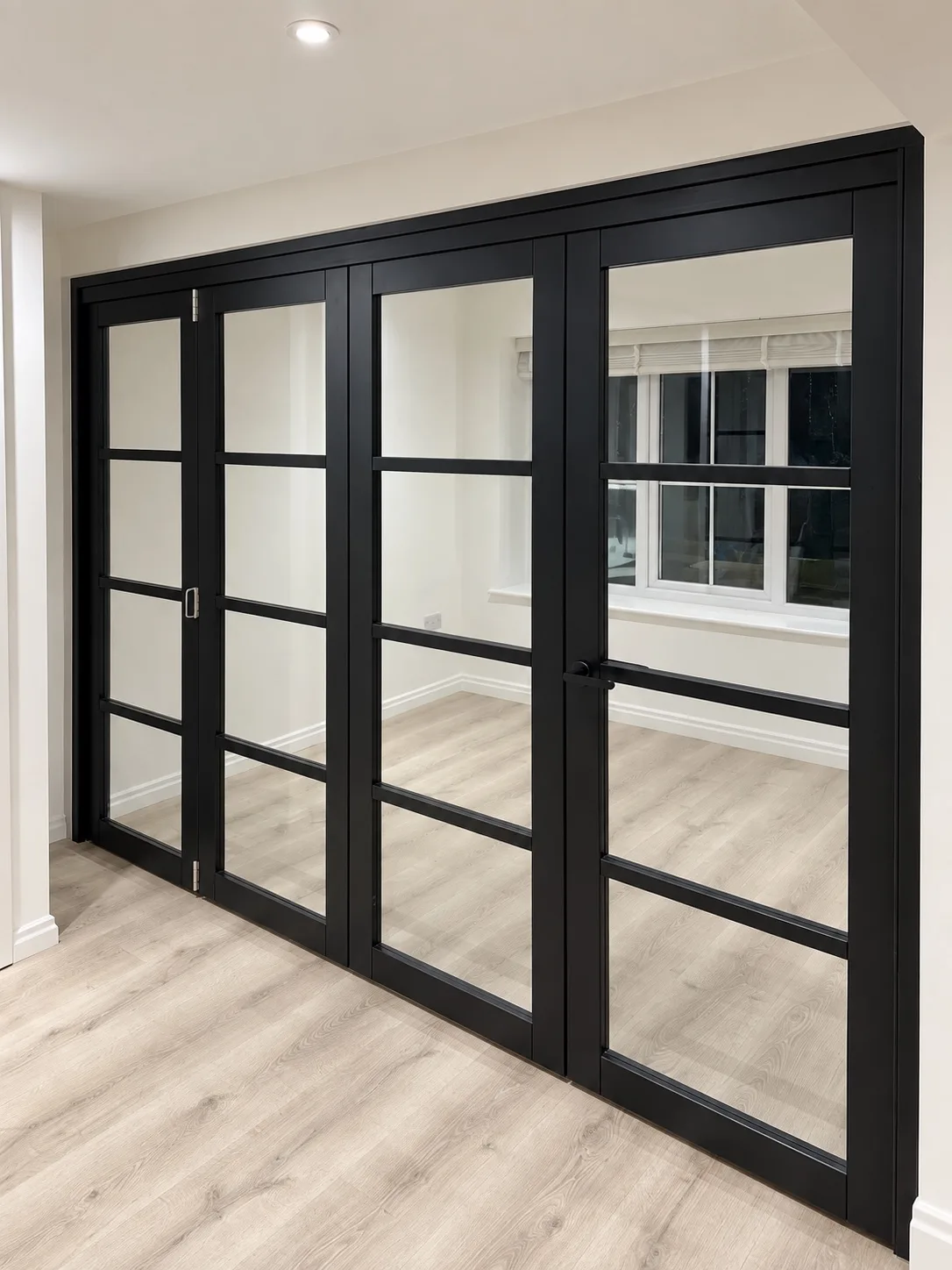 Black glazed internal doors fitted by L&R Joinery