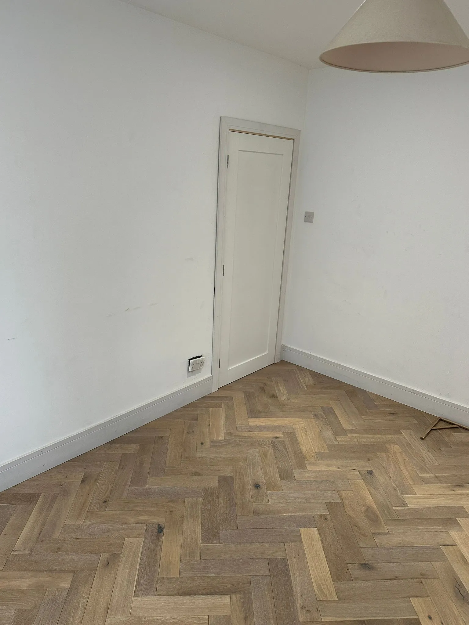 Herringbone oak flooring in bedroom